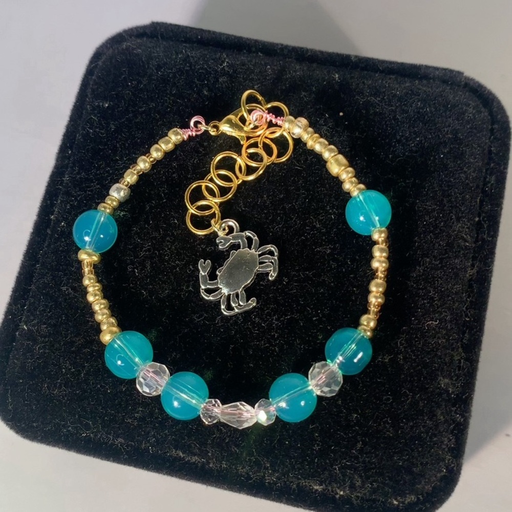 SEA GLASS ORBIT — Handcrafted Aquamarine & Gold Glass Bead Bracelet w Crab Charm